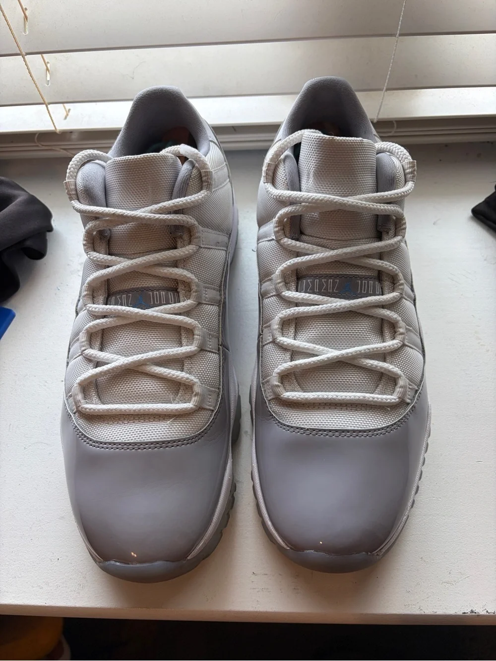 Jordan 11 low cement grey